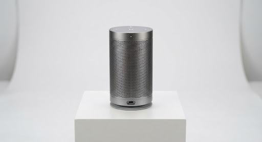 Reference raw AI output: tall cylindrical speaker